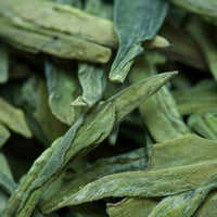 Dried green tea leaves, the natural source of L-theanine