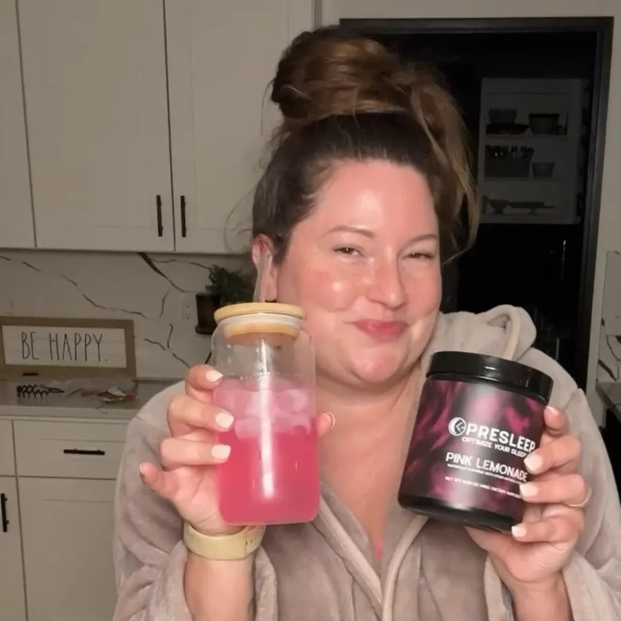 PreSleep customer in her robe holding her drink and jar
