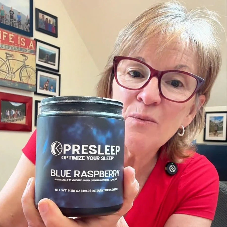 PreSleep customer in a red top holding her Blue Raspberry jar